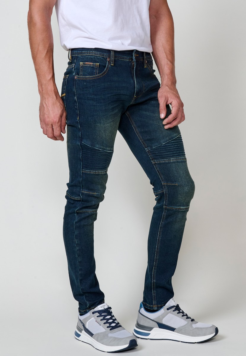 Jean homme Biker Skinny Fit en denim stretch bleu foncé. Coupe ajustée avec détails biker. 98 % coton, 2 % élasthanne.