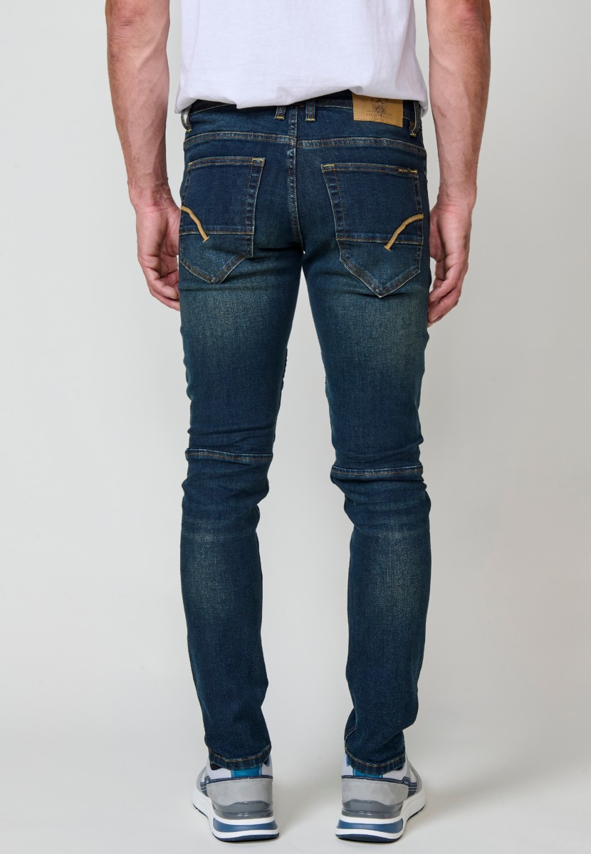 Jean homme Biker Skinny Fit en denim stretch bleu foncé. Coupe ajustée avec détails biker. 98 % coton, 2 % élasthanne.