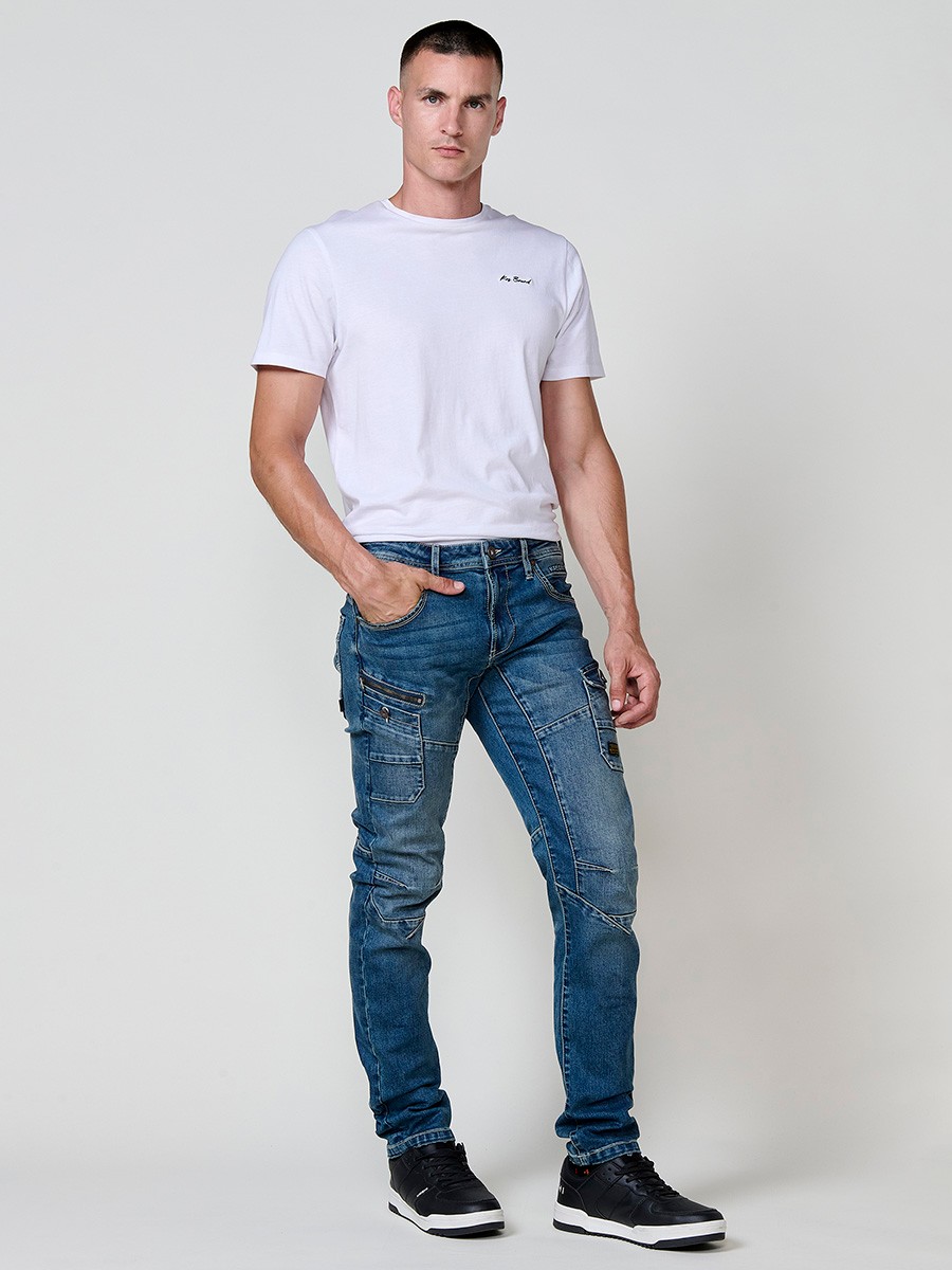 Jean style workwear pour homme en bleu foncé, coupe regular fit.
