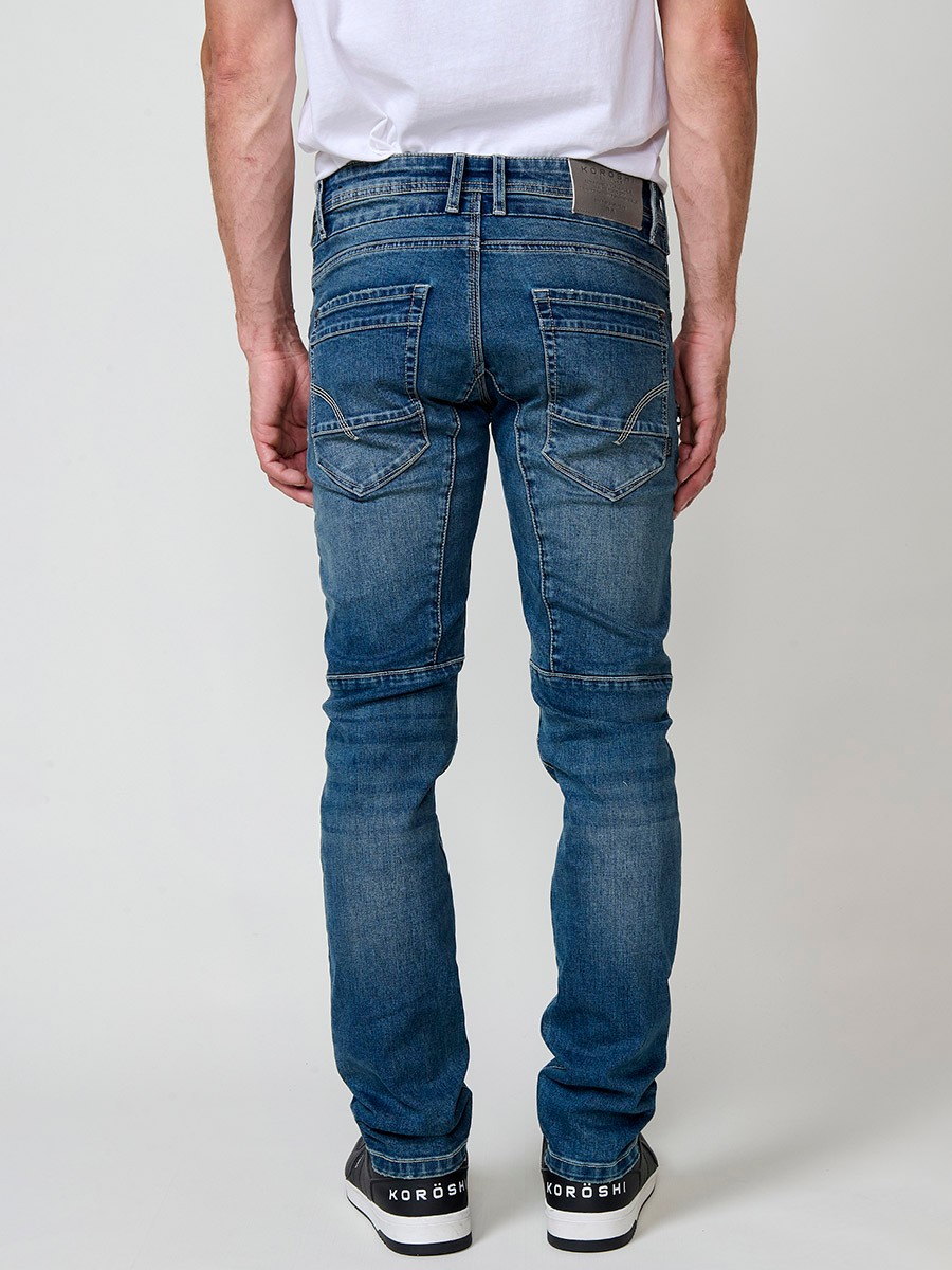 Jean style workwear pour homme en bleu foncé, coupe regular fit.