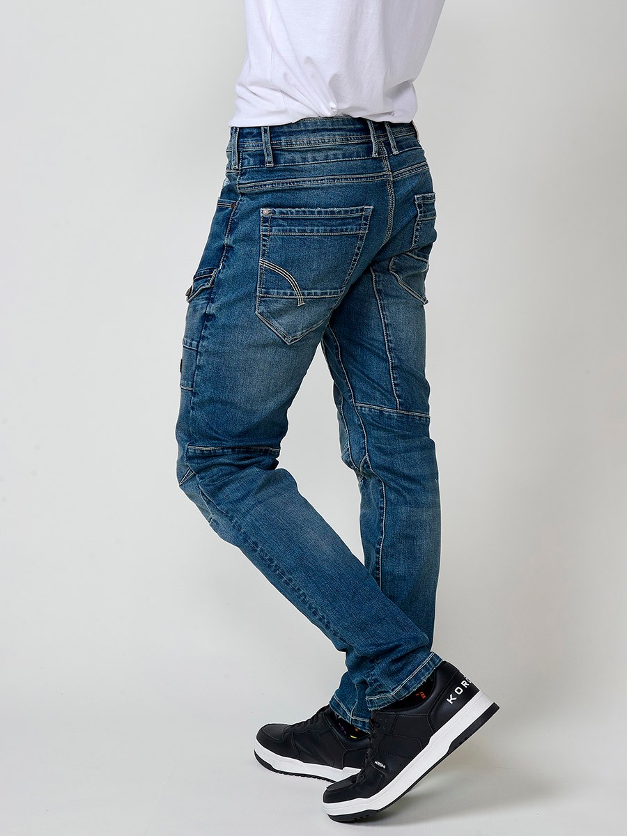 Jean style workwear pour homme en bleu foncé, coupe regular fit.
