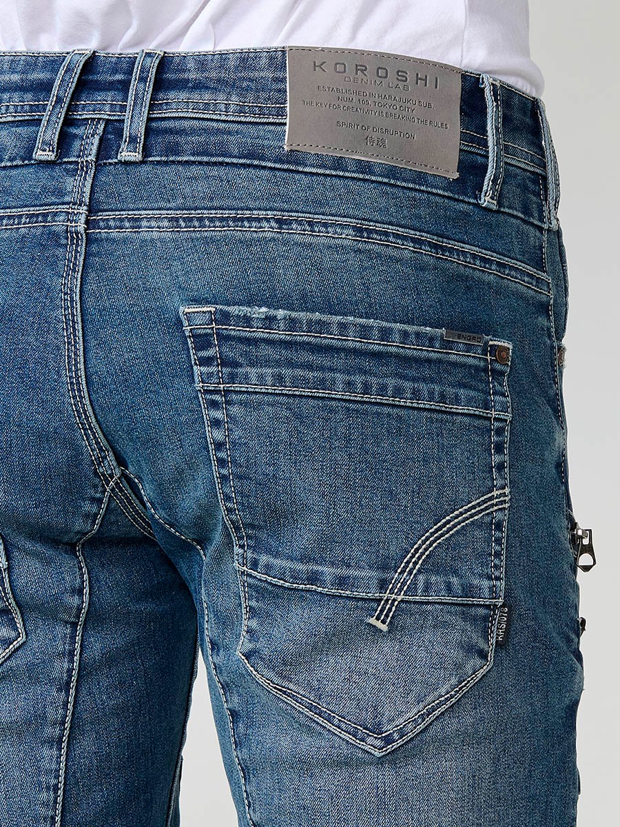 Jean style workwear pour homme en bleu foncé, coupe regular fit.