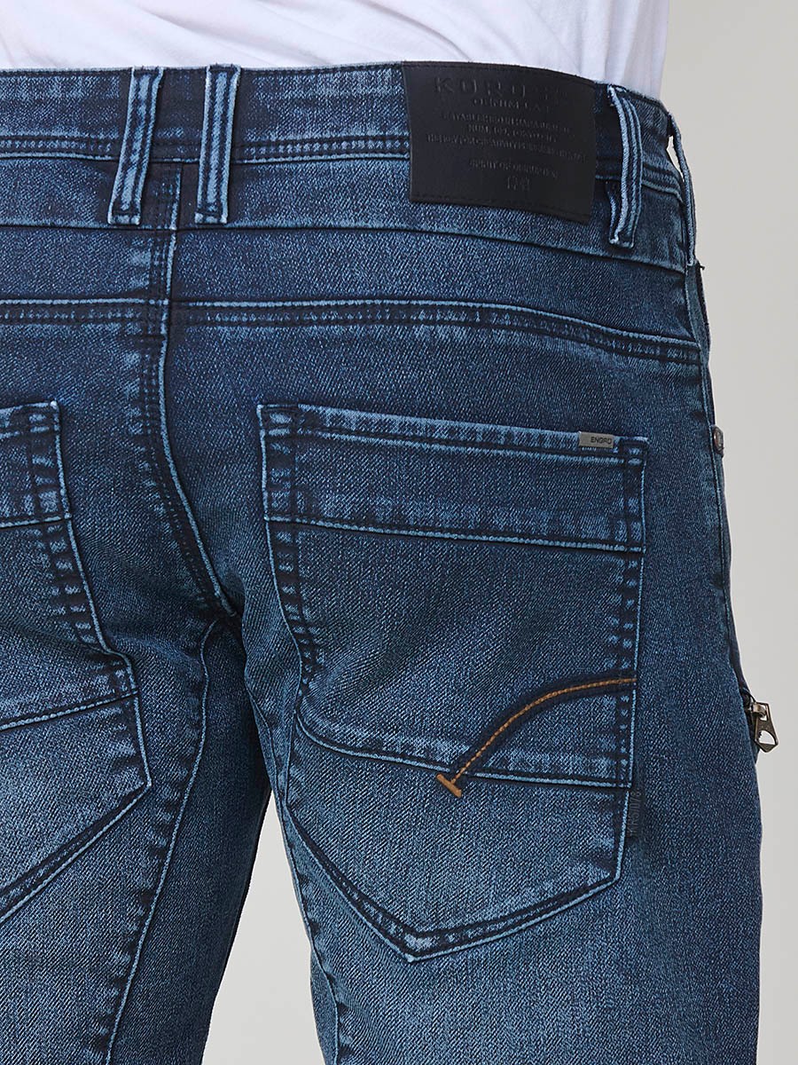 Pantalón vaquero workwear regular fit de hombre en azul oscuro. Tejido 98% algodón, 2% elastano, resistente y cómodo.