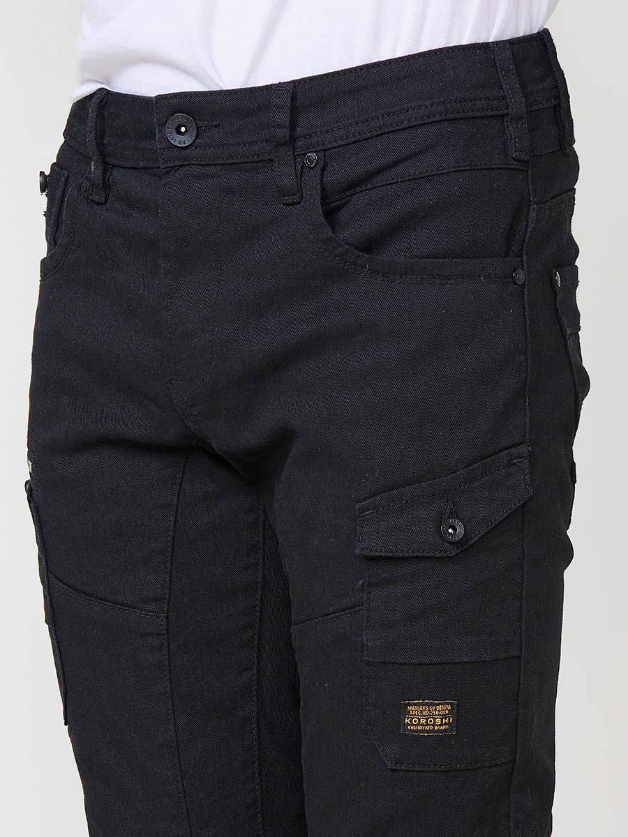 Jean homme noir coupe regular fit style workwear. Fermeture zippée et bouton. 3