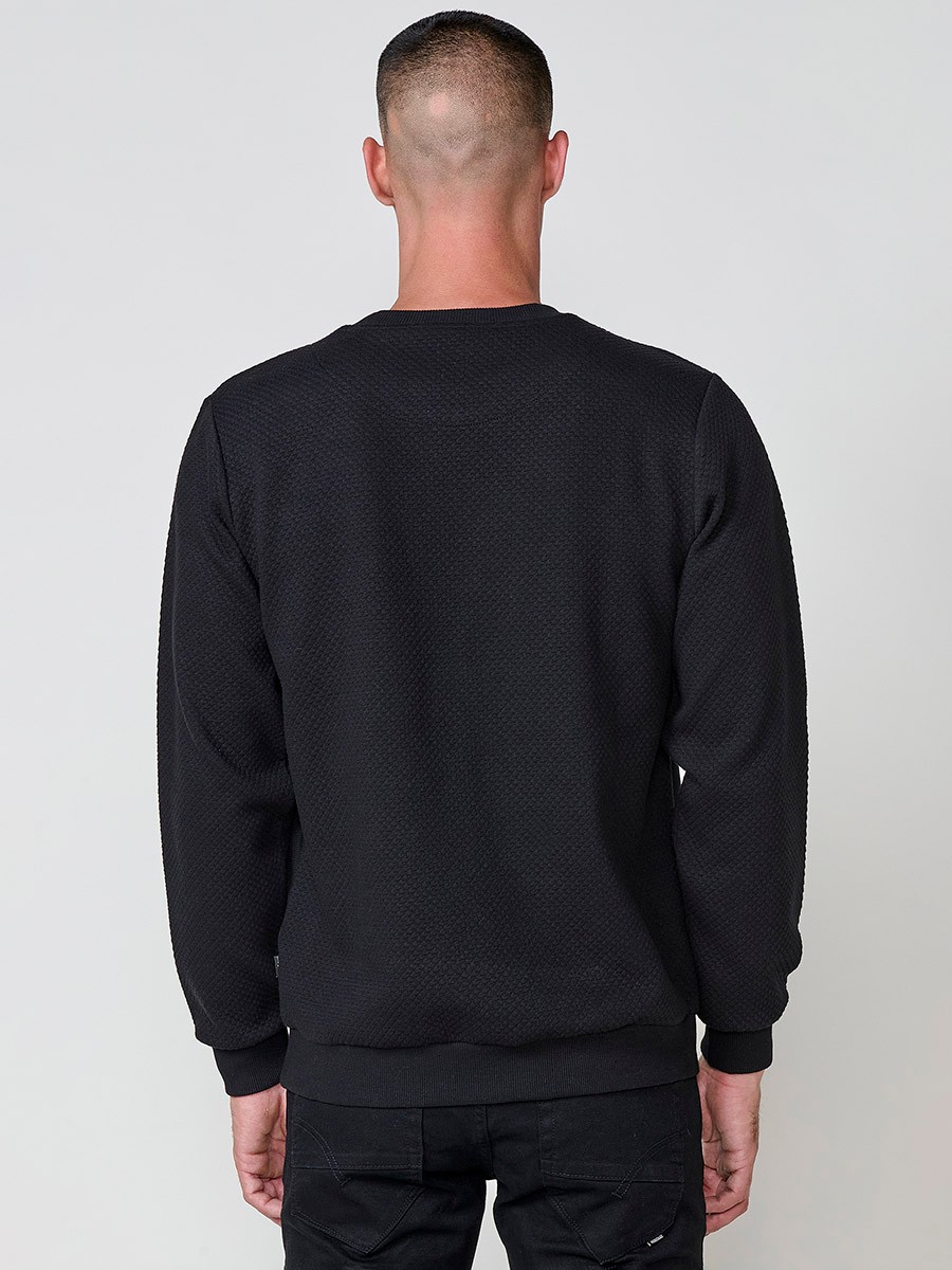 Men’s black hoodie with adjustable drawstring hood. Cotton and polyester blend fabric for comfort and urban style.
