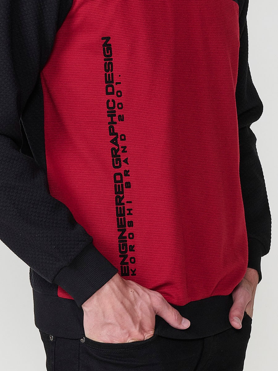 Men’s red hoodie with adjustable drawstring hood. Cotton and polyester blend fabric for comfort and urban style.