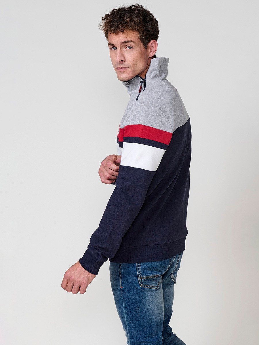 Men’s navy sweatshirt with high collar and zipper. Cotton and polyester blend fabric for comfort, breathability and style.