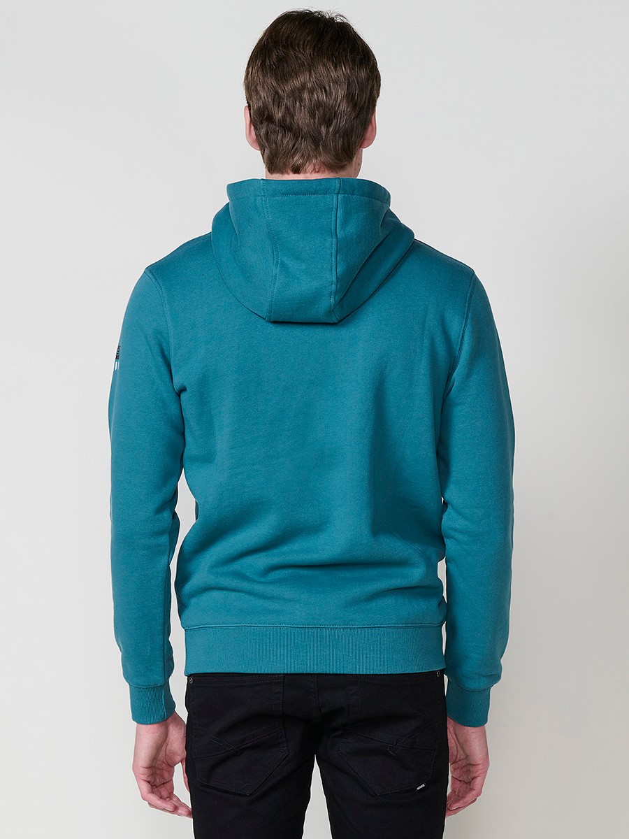 Sudadera de hombre en color menta con capucha. Tejido mezcla de algodón y poliéster que aporta comodidad, resistencia y un estilo urbano moderno.