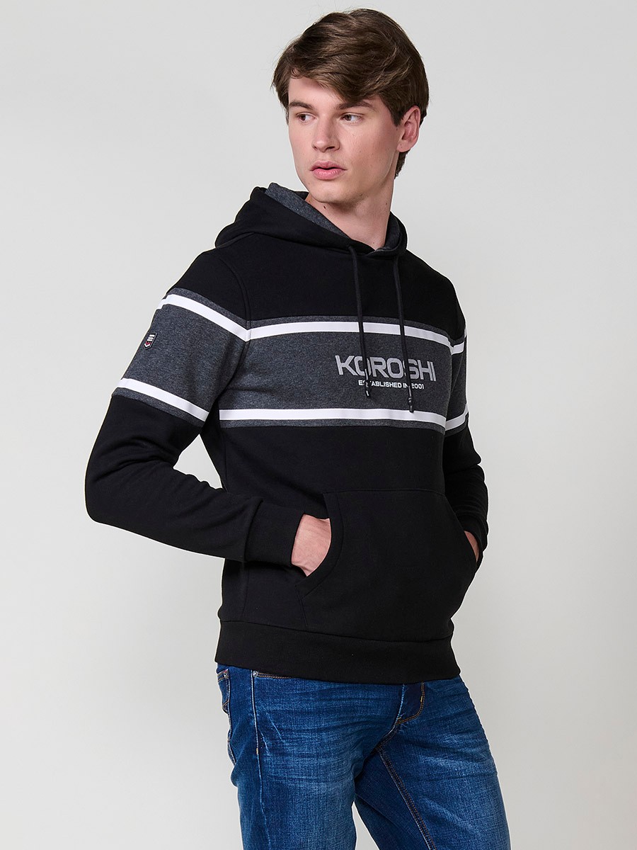 Men’s black hoodie in cotton and polyester blend for comfort, durability and modern urban style.