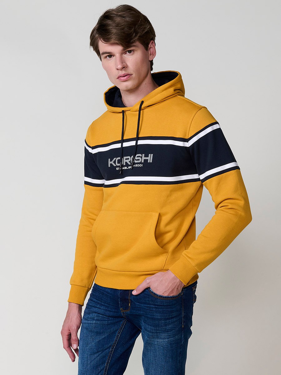 Men’s mustard hoodie in cotton and polyester blend for comfort, durability and modern urban style.