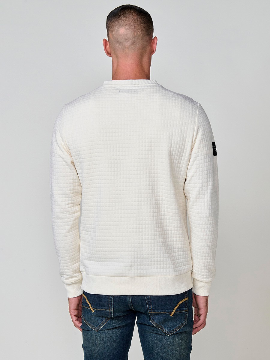 Sudadera de hombre en color crudo, con cremallera lateral en el cuello. Diseño cómodo y versátil, ideal para un estilo casual y urbano.