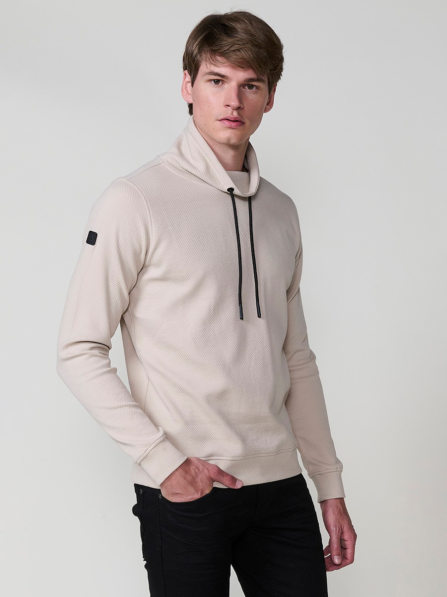 Men’s beige sweatshirt with long sleeves and high neck. Cotton and polyester blend for comfort and modern style.