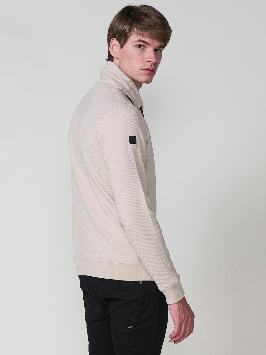 Men’s beige sweatshirt with long sleeves and high neck. Cotton and polyester blend for comfort and modern style.