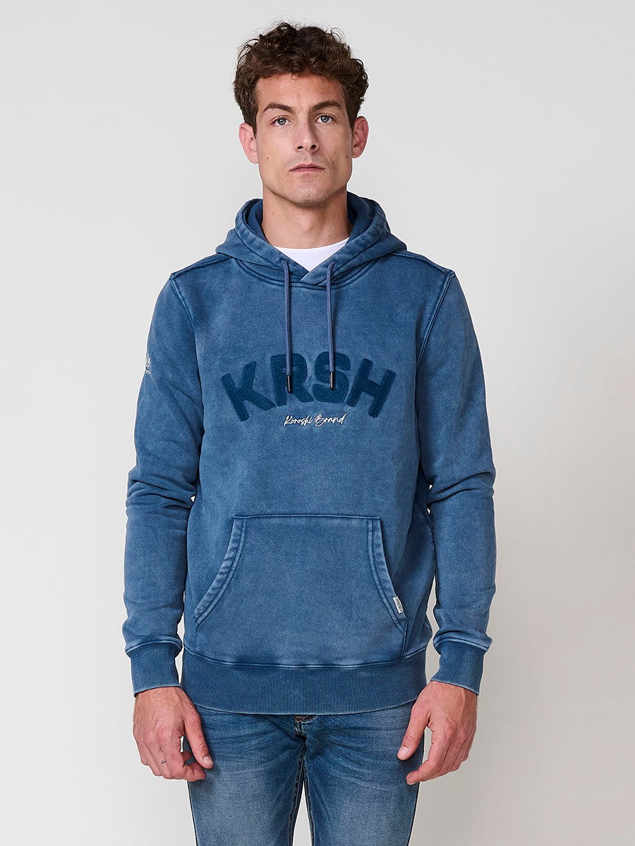 Sudadera azul de hombre con capucha y manga larga. Confección en algodón y poliéster para un estilo urbano y cómodo.