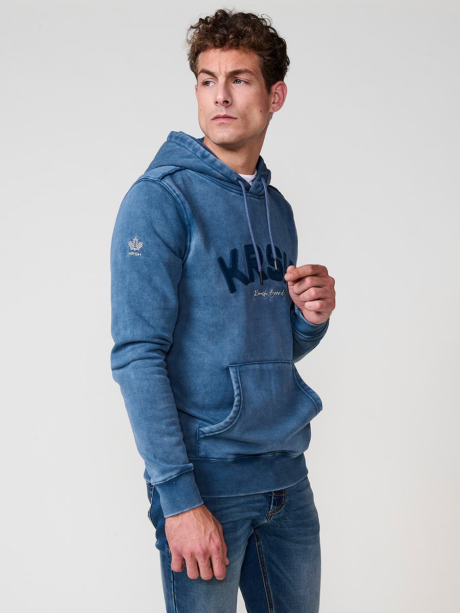 Sudadera azul de hombre con capucha y manga larga. Confección en algodón y poliéster para un estilo urbano y cómodo.