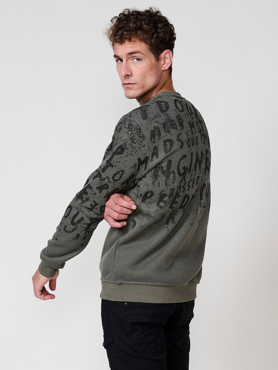 Sudadera kaki de hombre con cuello redondo. Exterior en tricot e interior suave para máxima comodidad y estilo urbano.