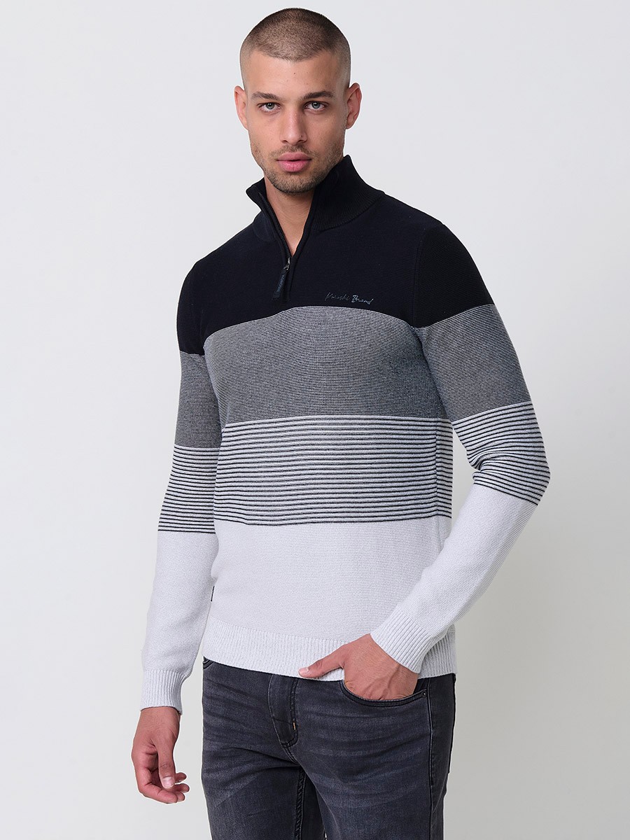 Jersey negro de hombre en tricot con cuello redondo y manga larga. Confección 100% acrílico para un estilo actual y versátil.