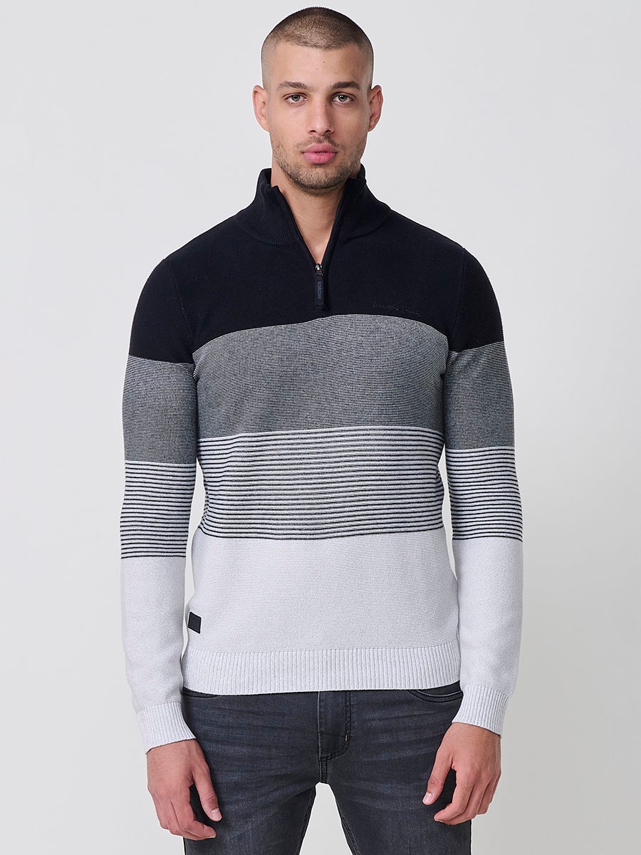 Jersey negro de hombre en tricot con cuello redondo y manga larga. Confección 100% acrílico para un estilo actual y versátil.