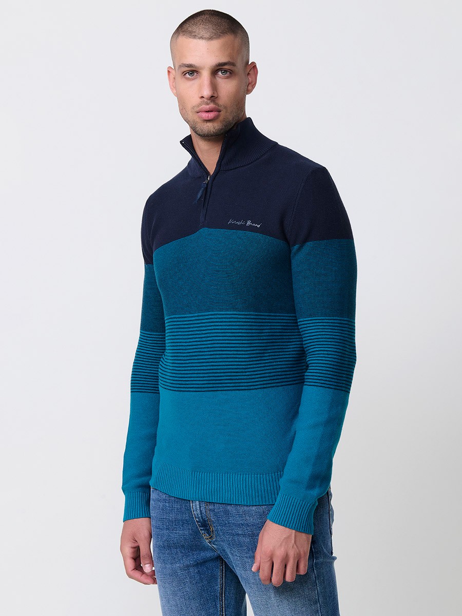 Jersey navy de hombre en tricot con cuello redondo y manga larga. Confección 100% acrílico para un estilo versátil y moderno.