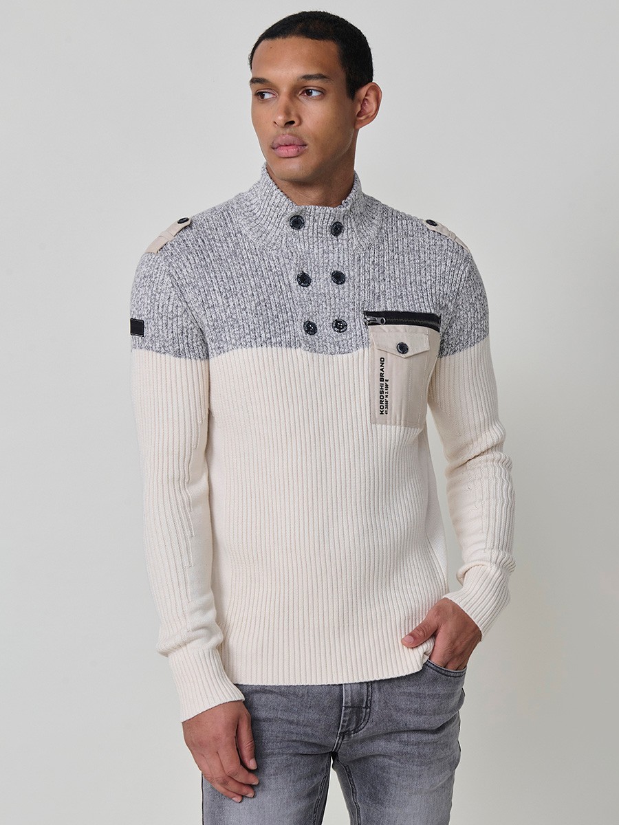 Jersey crudo de hombre en tricot con cuello redondo y manga larga. Confección 100% acrílico para un estilo versátil y cómodo.