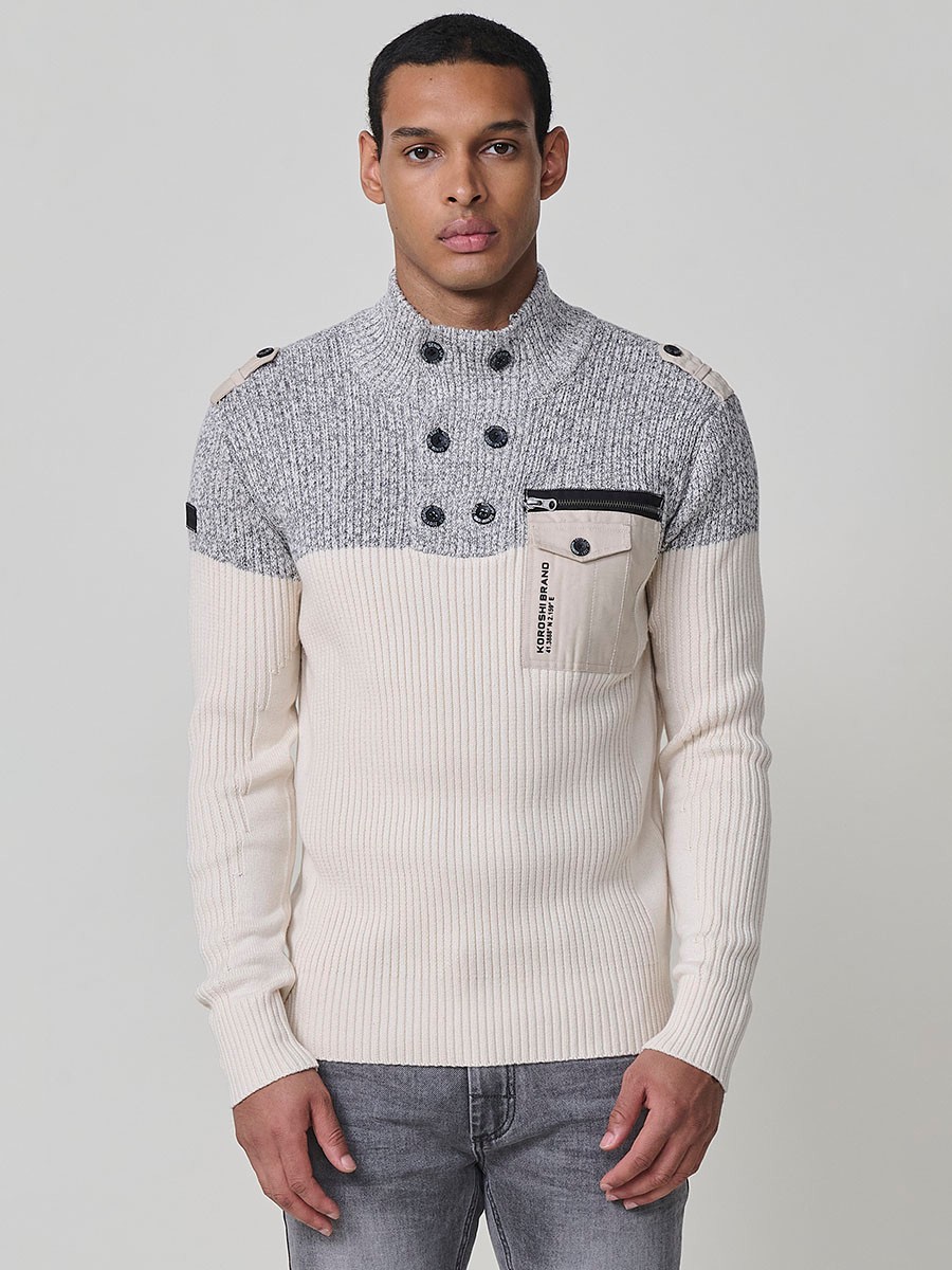 Jersey crudo de hombre en tricot con cuello redondo y manga larga. Confección 100% acrílico para un estilo versátil y cómodo.