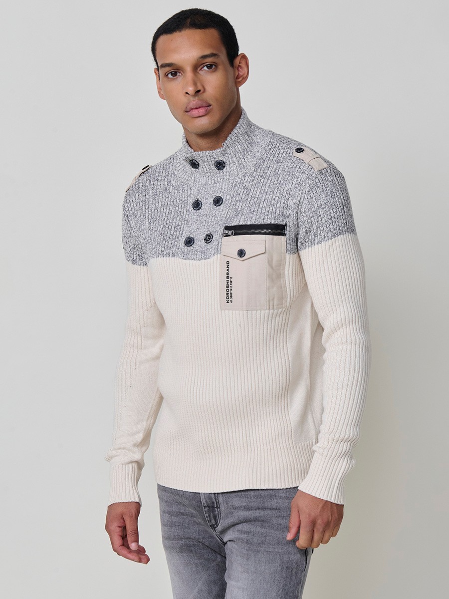 Jersey crudo de hombre en tricot con cuello redondo y manga larga. Confección 100% acrílico para un estilo versátil y cómodo.