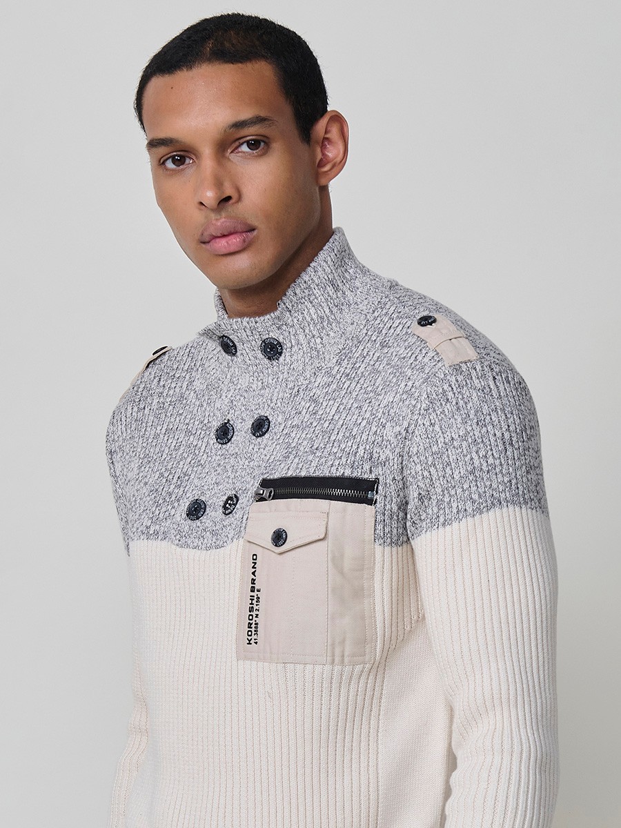 Jersey crudo de hombre en tricot con cuello redondo y manga larga. Confección 100% acrílico para un estilo versátil y cómodo.