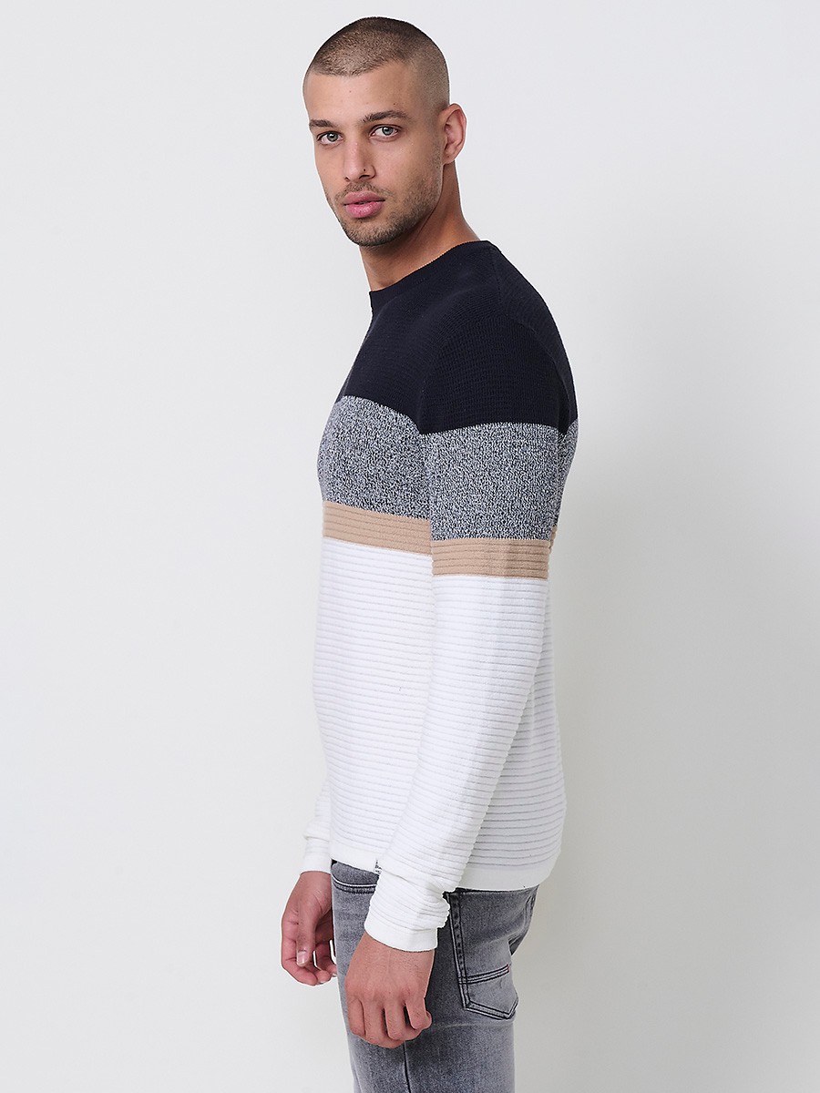 Jersey crudo de hombre en tricot con cuello redondo y manga larga. Tejido 100% acrílico, ligero y versátil para un estilo moderno.