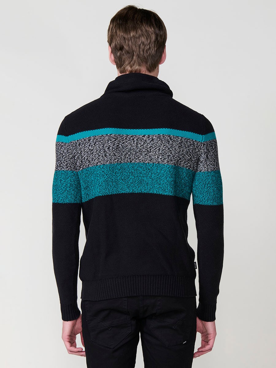 Jersey negro de hombre en tricot con cuello redondo y manga larga. Confección 100% acrílico para un estilo cómodo, moderno y versátil.