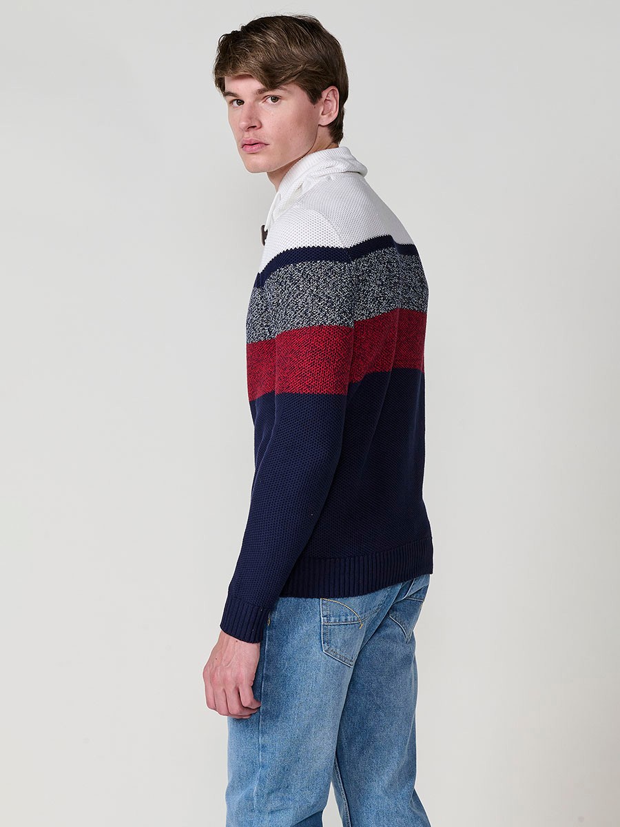Jersey navy de hombre en tricot con cuello redondo y manga larga. 100% acrílico para un estilo moderno, cómodo y versátil.