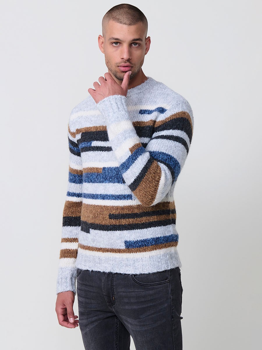 Jersey de rayas multicolor en tricot para hombre con cuello redondo y manga larga. Tejido 77% poliéster y 23% acrílico, moderno y versátil.
