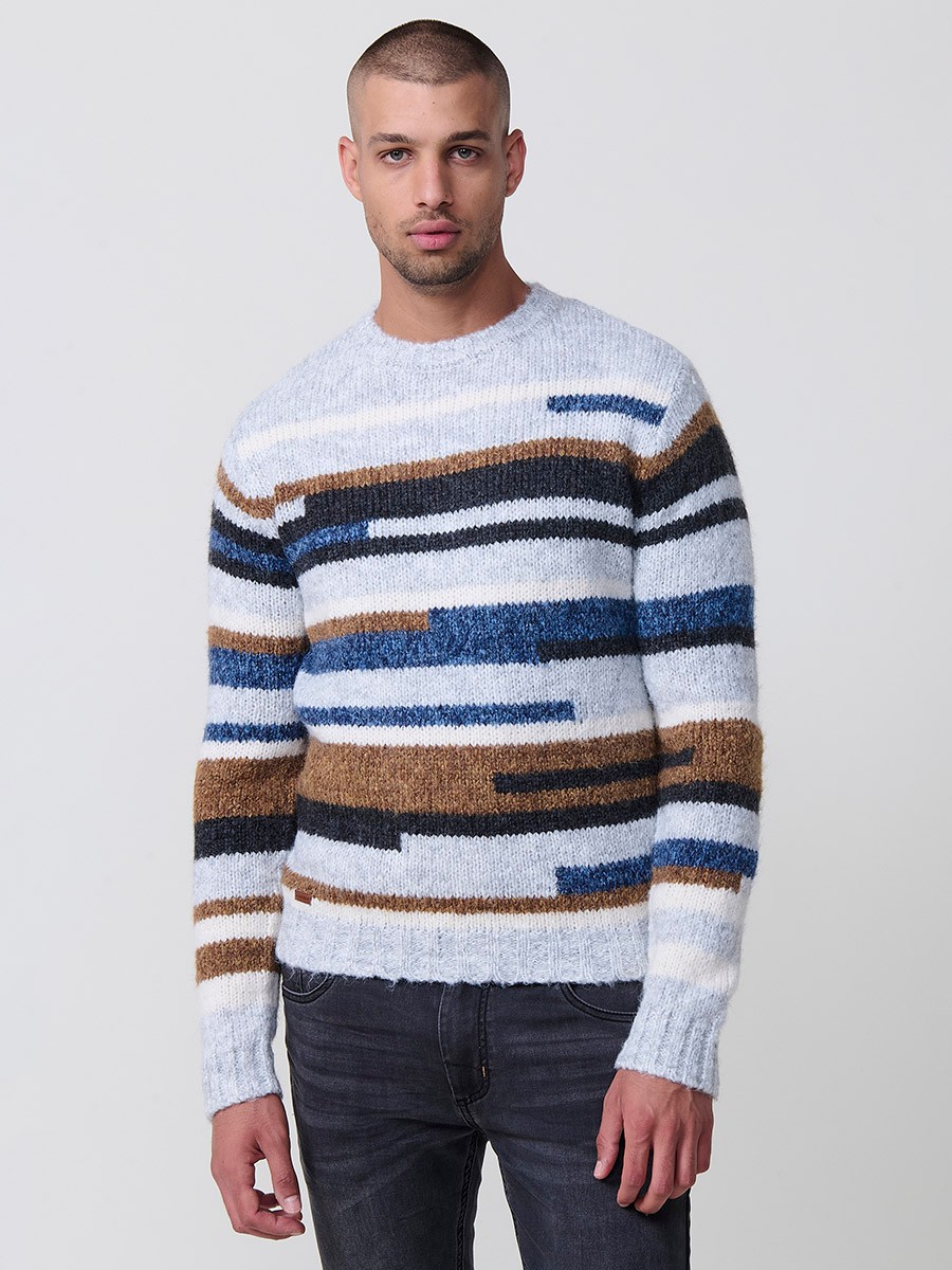 Jersey de rayas multicolor en tricot para hombre con cuello redondo y manga larga. Tejido 77% poliéster y 23% acrílico, moderno y versátil.