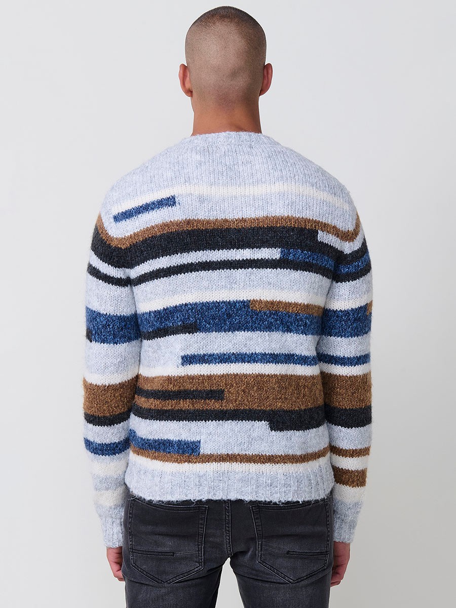 Jersey de rayas multicolor en tricot para hombre con cuello redondo y manga larga. Tejido 77% poliéster y 23% acrílico, moderno y versátil.