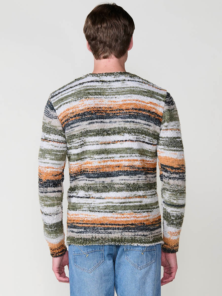Jersey jaspeado multicolor de hombre en tricot con cuello redondo y manga larga. Confección 100% poliéster, moderno, ligero y cómodo.