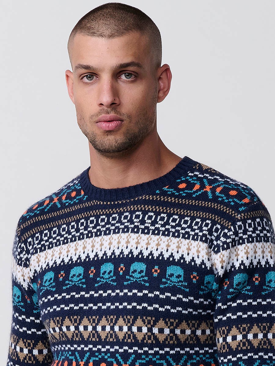 Jersey navy de hombre en tricot con cuello redondo y manga larga. Tejido mezcla de acrílico, poliamida y poliéster, moderno y versátil.