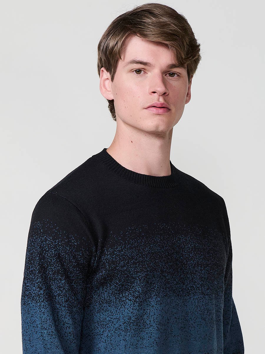 Jersey petróleo de hombre en tricot con cuello redondo y manga larga. Tejido 100% acrílico, ligero, cómodo y atemporal.