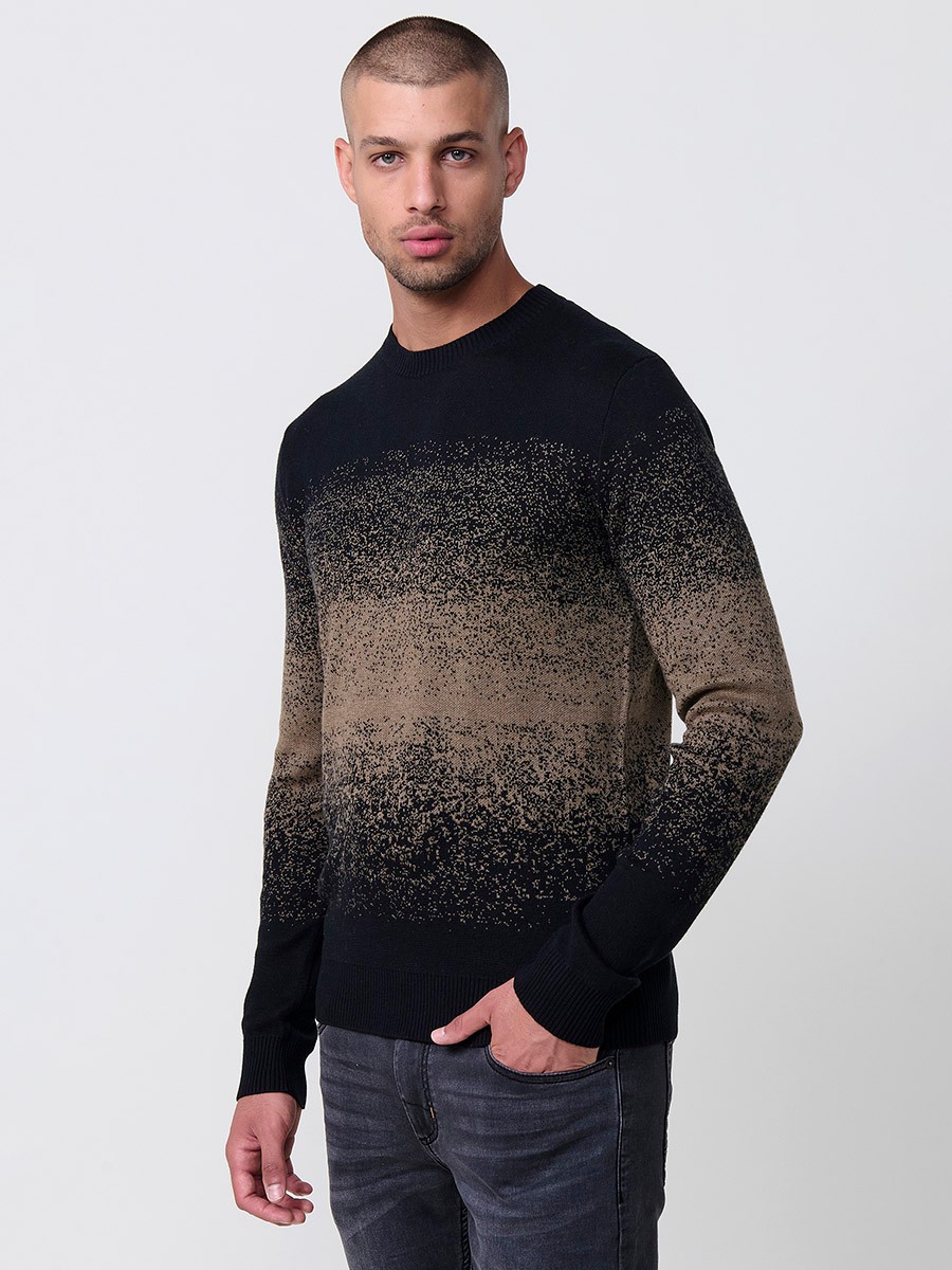 Jersey visón de hombre en tricot con cuello redondo y manga larga. Tejido 100% acrílico, cómodo, versátil y atemporal.