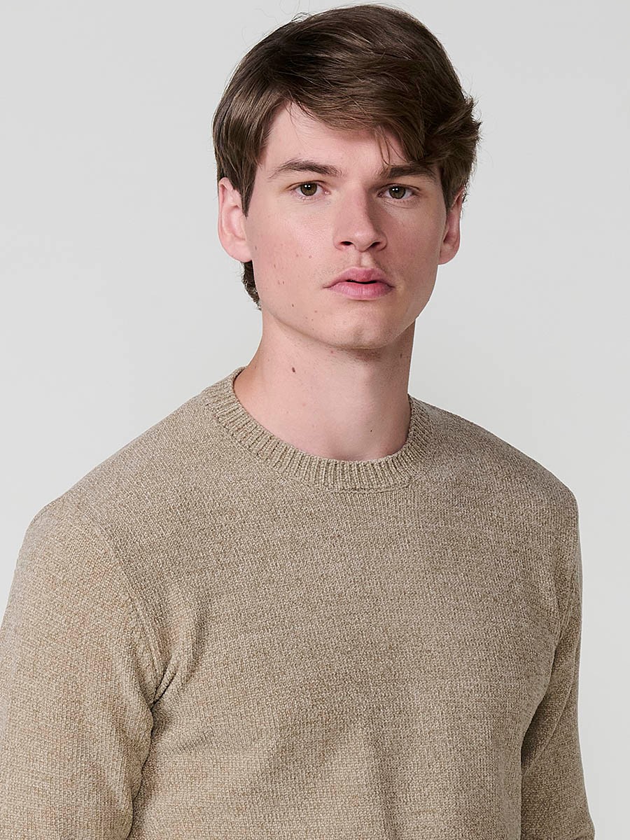 Men’s beige tricot sweater with crew neck, long sleeves, and ribbed hems. Polyester and polyamide blend, modern and comfortable.