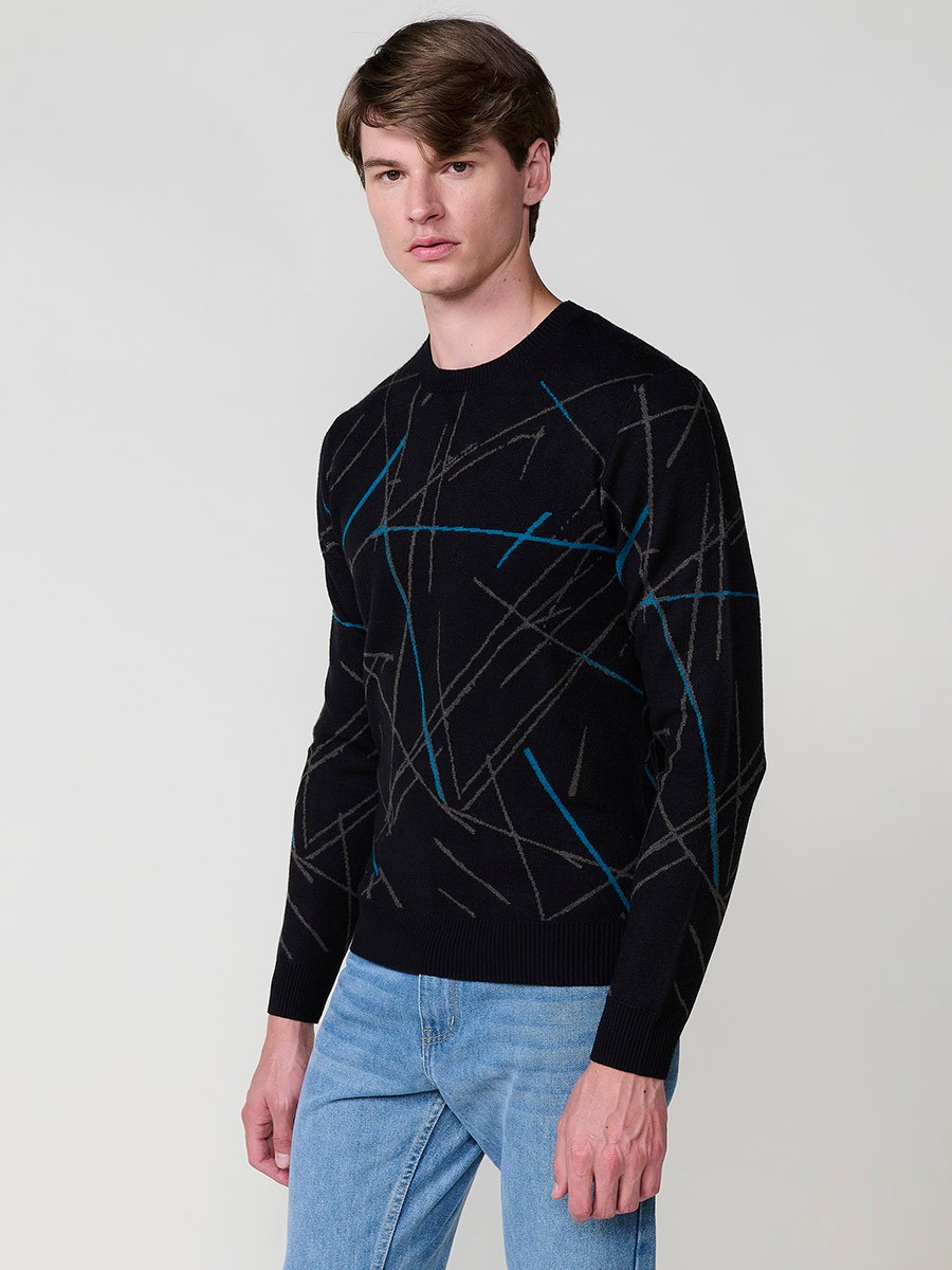 Jersey negro de hombre en tricot con cuello redondo y manga larga. Tejido 100% acrílico, cómodo, versátil y atemporal.
