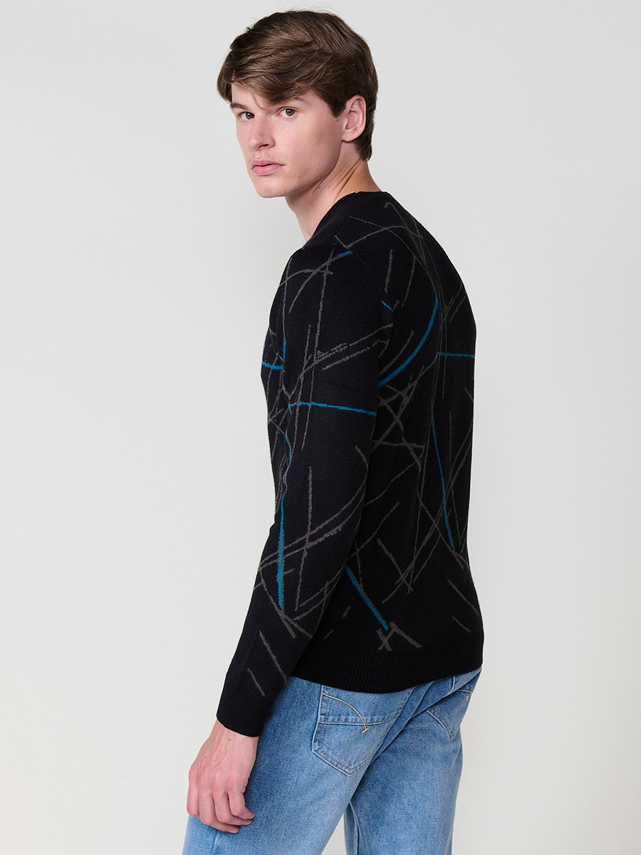 Jersey negro de hombre en tricot con cuello redondo y manga larga. Tejido 100% acrílico, cómodo, versátil y atemporal.