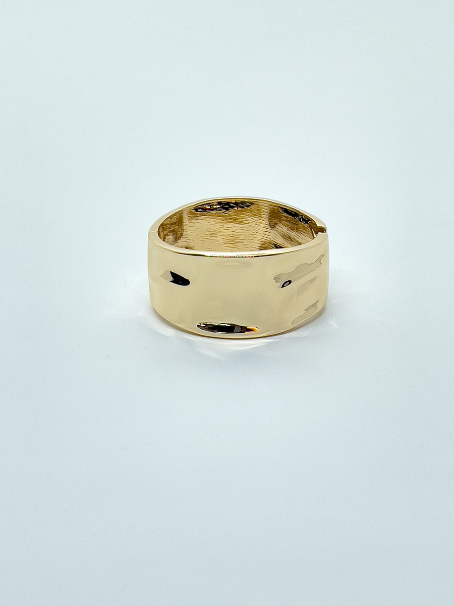 Bracelet rigide doré avec fermoir pour femme