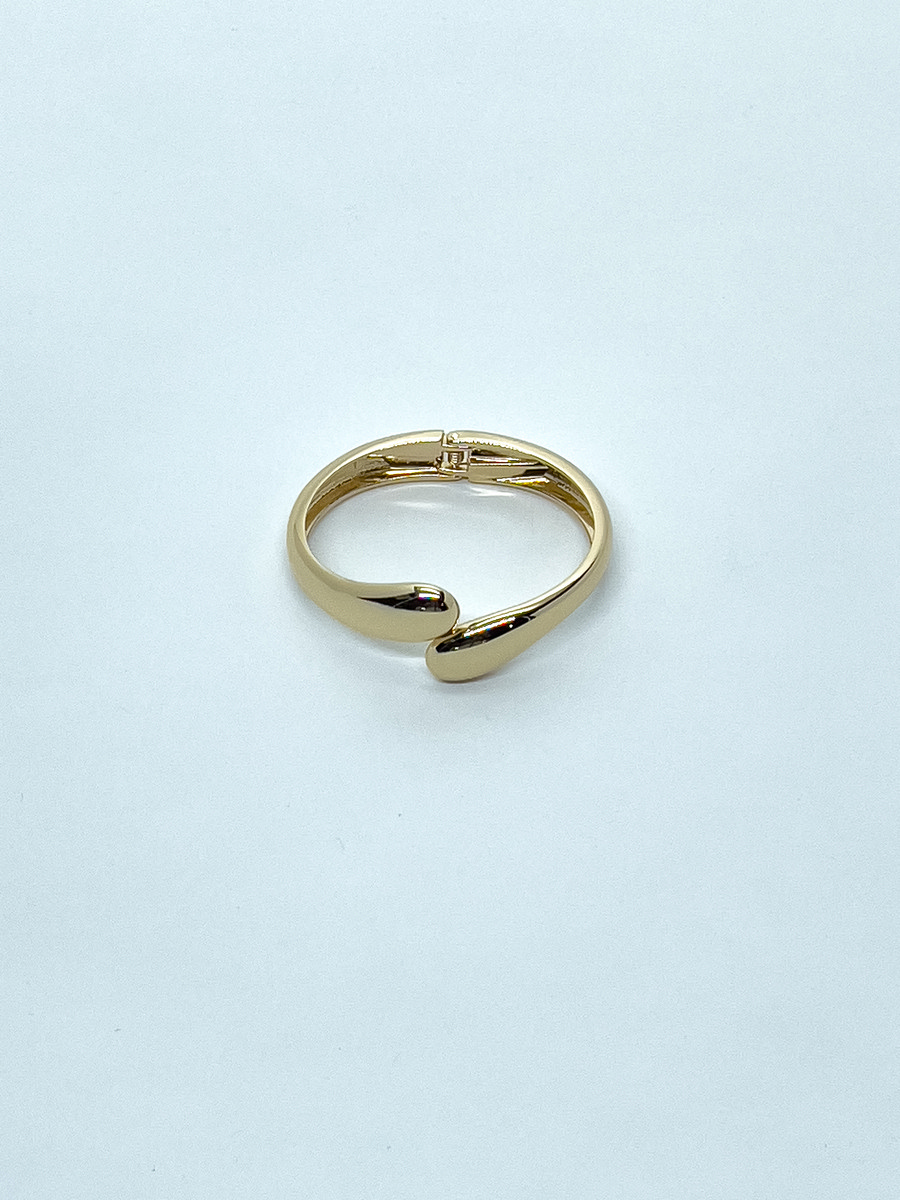 Bracelet rigide doré avec fermoir pour femme