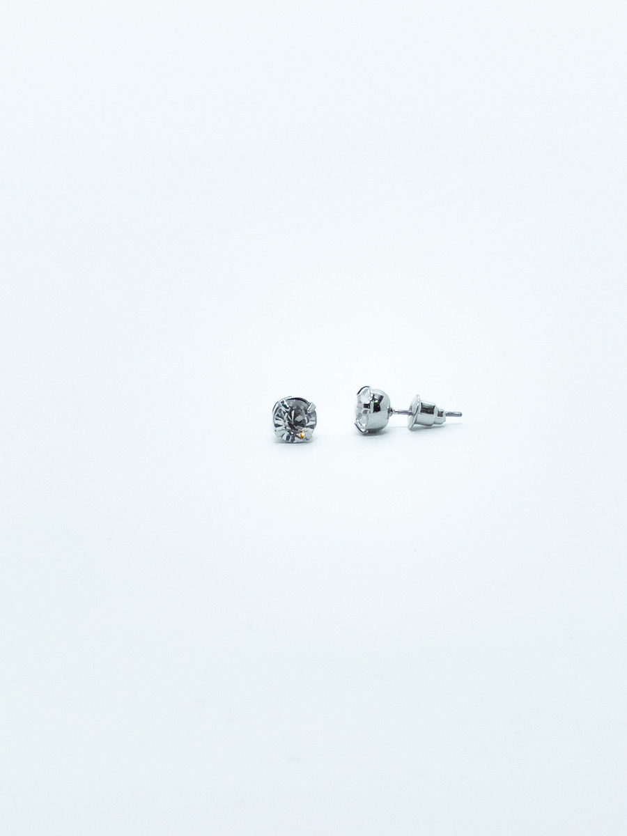 Set de boucles d’oreilles argentées brillantes pour femme