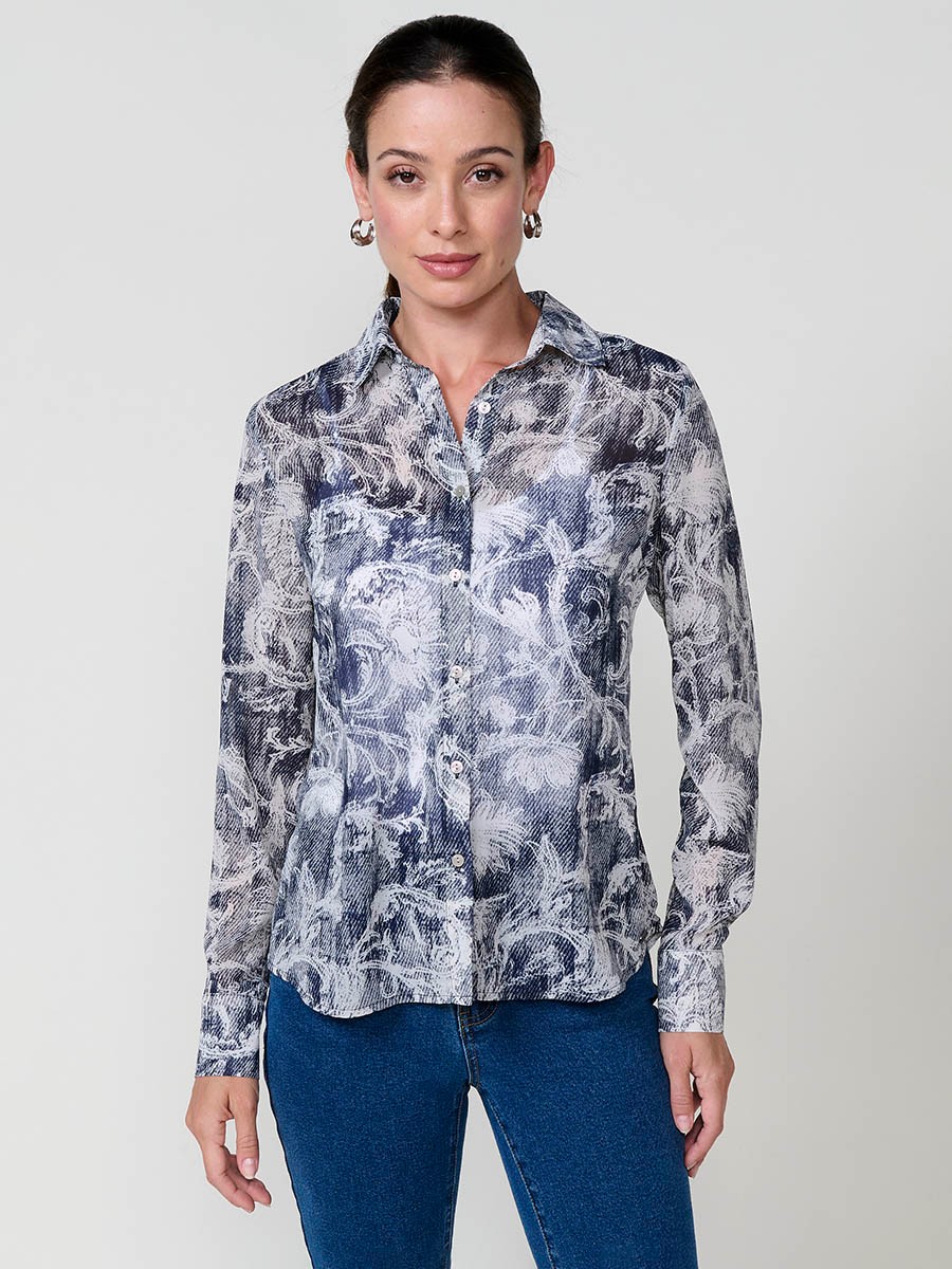 Women’s chiffon shirt with floral print and button closure.