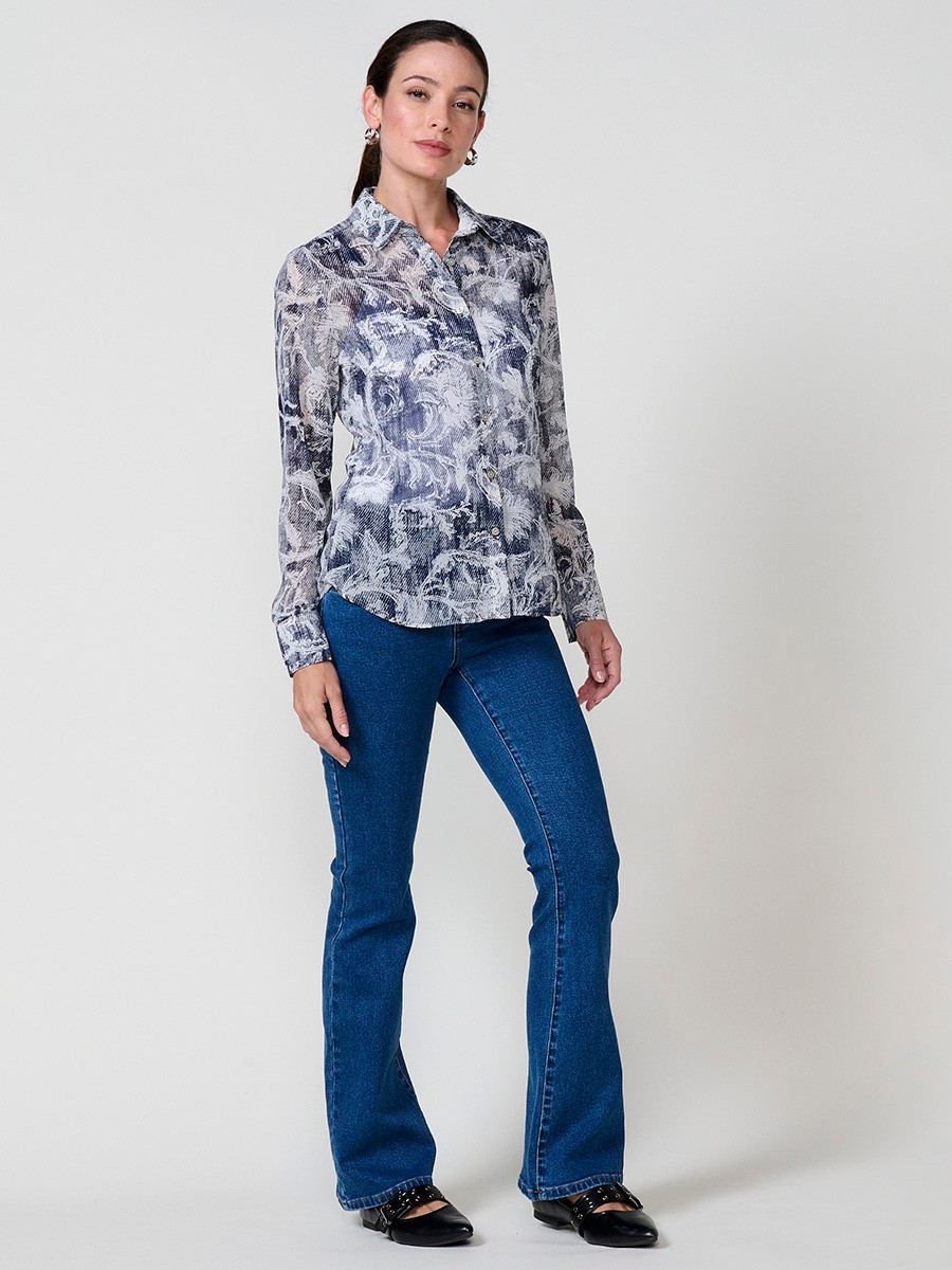 Women’s chiffon shirt with floral print and button closure.
