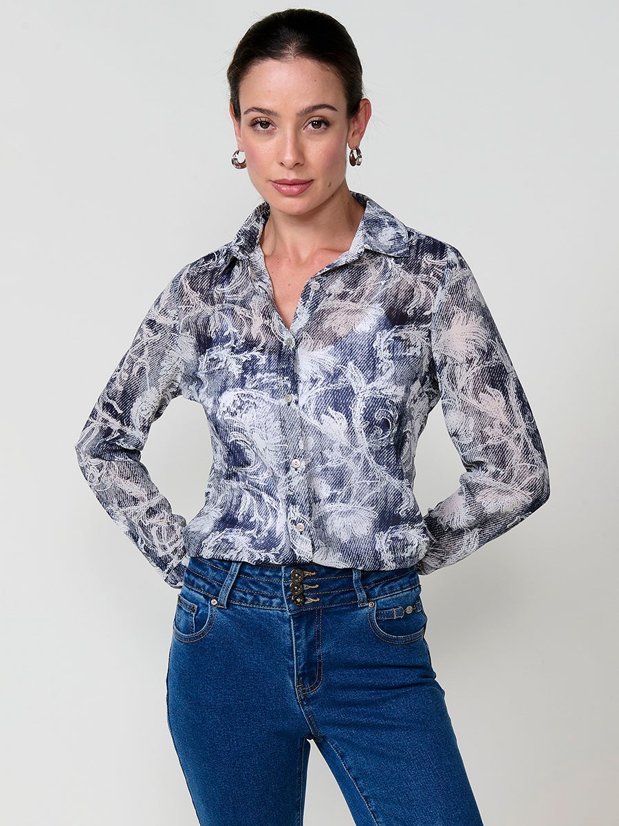 Women’s chiffon shirt with floral print and button closure.