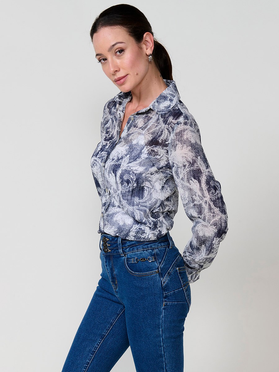Women’s chiffon shirt with floral print and button closure.