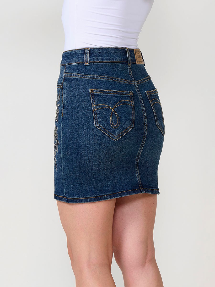 Falda corta denim mujer azul oscuro con bordado floral y botones metálicos 4