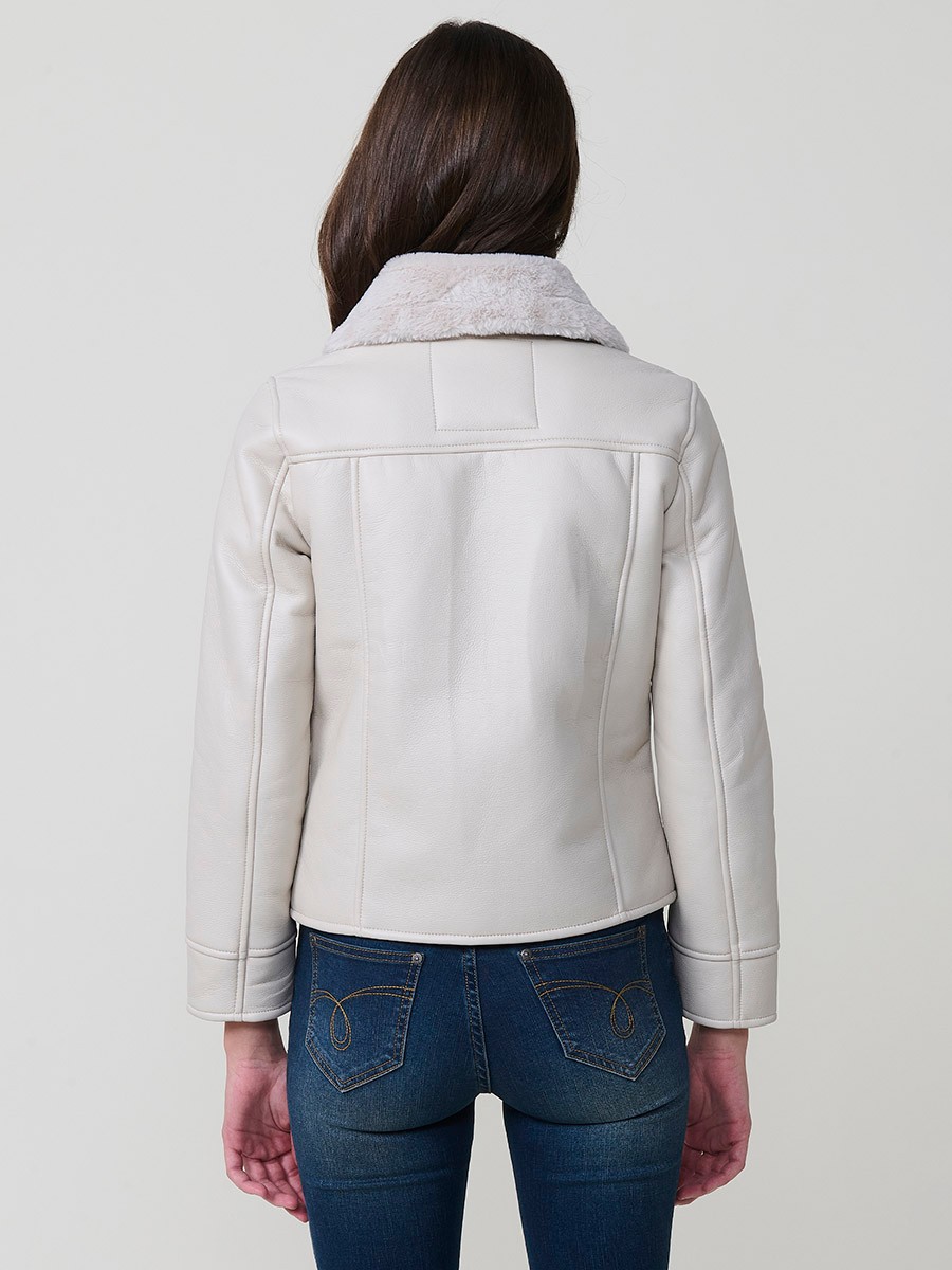 Women’s white double-faced faux leather jacket with faux fur lining, metallic zip pockets and buckle neck detail.