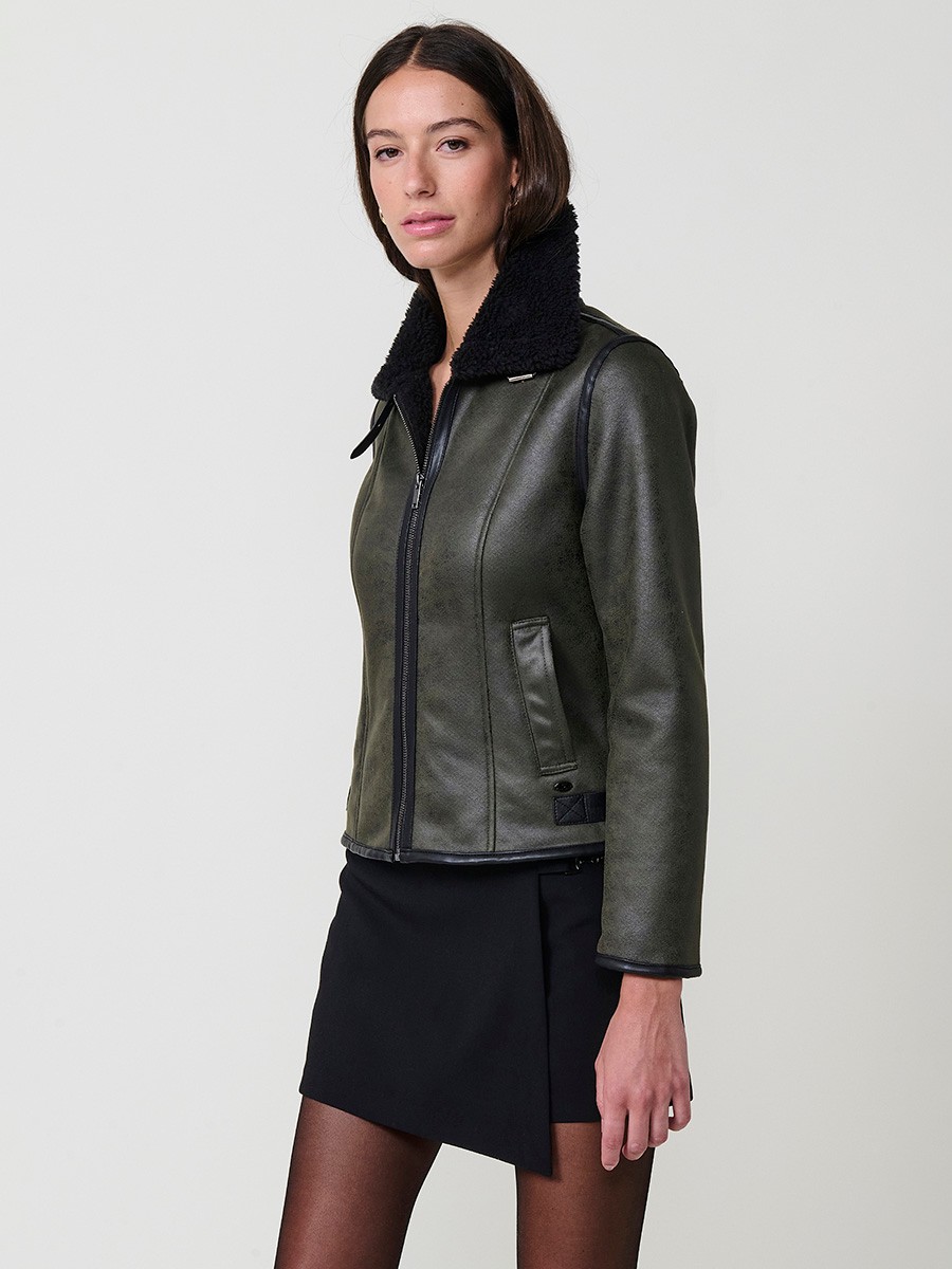 Women’s double-sided jacket, faux leather exterior, faux fur interior, metallic zipper and side buckles in khaki.